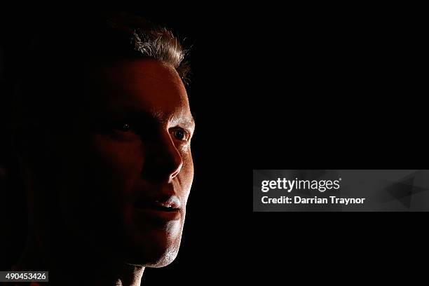 Sam Mitchell of the Hawks speaks to the media before a Hawthorn Hawks AFL training session at Waverley Park on September 29, 2015 in Melbourne,...