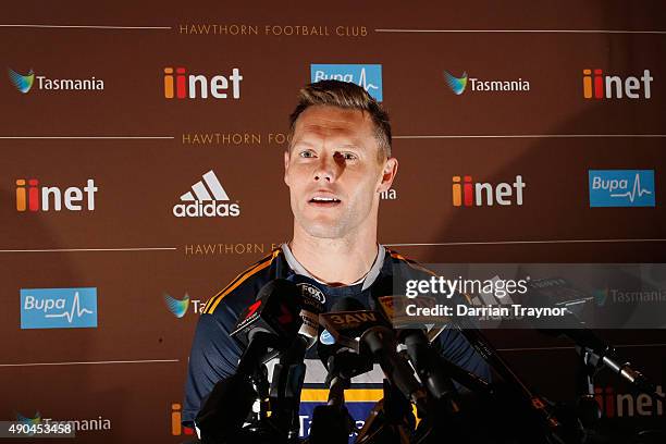 Sam Mitchell of the Hawks speaks to the media before a Hawthorn Hawks AFL training session at Waverley Park on September 29, 2015 in Melbourne,...