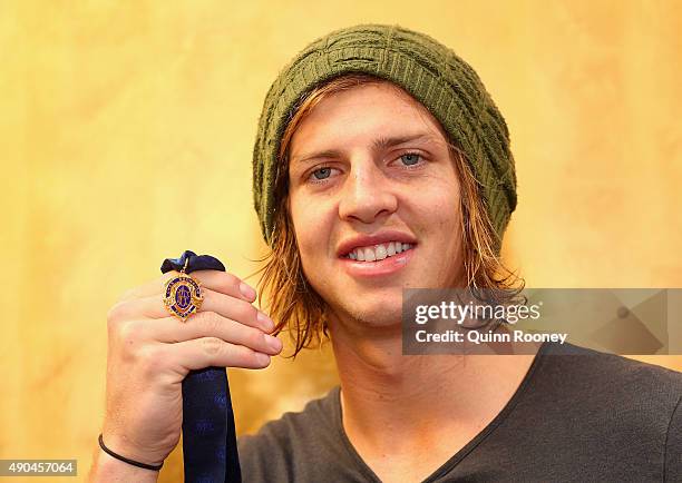 Brownlow Medal winner Nat Fyfe of the Dockers poses during a media opportunity at Crown Entertainment Complex on September 29, 2015 in Melbourne,...