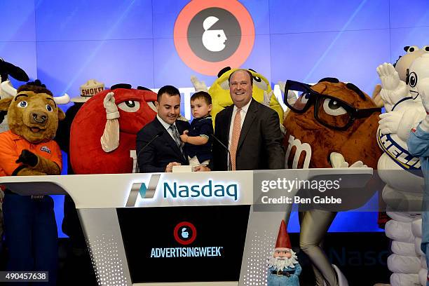 David Wicks, Advertising Week President and COO Lance Pillersdorf with the Advertising Week brand mascots ring The NASDAQ Closing Bell during...