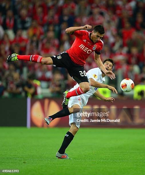 Nicolas Gaitan of Benfica clashes with Coke of Sevilla during the UEFA Europa League Final match between Sevilla FC and SL Benfica at Juventus...