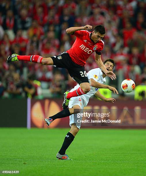 Nicolas Gaitan of Benfica clashes with Coke of Sevilla during the UEFA Europa League Final match between Sevilla FC and SL Benfica at Juventus...