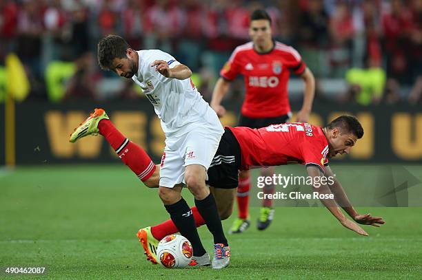 Coke of Sevilla clashes with Guilherme Siqueira of Benfica during the UEFA Europa League Final match between Sevilla FC and SL Benfica at Juventus...