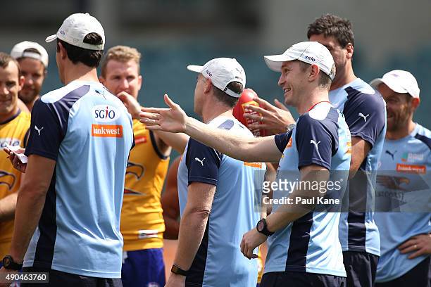 Adam Selwood assistant coach of the Eagles talks to his players during a West Coast Eagles AFL training session at Domain Stadium on September 29,...