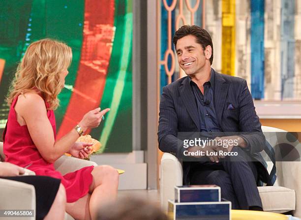 Co-host Candace Cameron Bure's co-star from "Full House" and the highly anticipated spin-off "Fuller House," John Stamos appear today, Monday,...