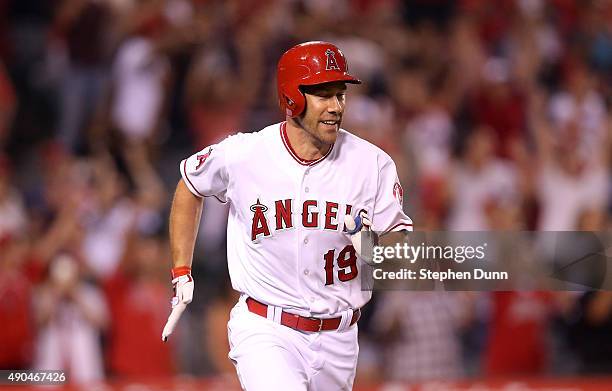 David Murphy of the Los Angeles Angels of Anaheim celebrates as he runs to first base on his walk off RBI single in the ninth inning against the...