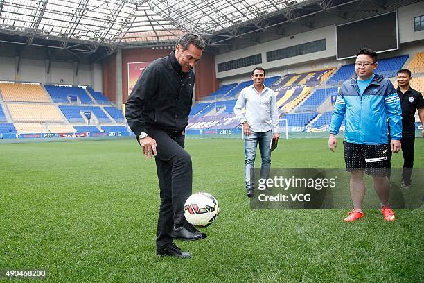 Vanderlei Luxemburgo, new head coach of Tianjin Songjiang Football Club, visits the club's football training base on September 28, 2015 in Tianjin,...