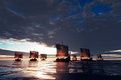 Viking ships sailing towards unknown land
