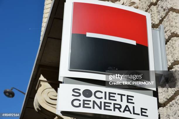 This photo taken on September 28, 2015 in Paris shows the logo of French bank Societe Generale. Societe Generale is considering to close 400 agencies...