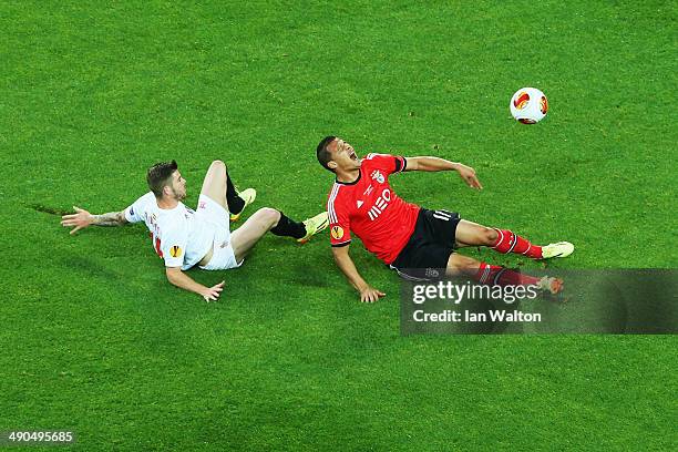 Denis Cheryshev of Sevilla and Guilherme Siqueira of Benfica compete for the ball during the UEFA Europa League Final match between Sevilla FC and SL...