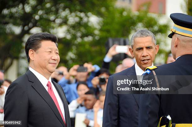 President Barack Obama and Chinese President Xi Jinping attand a joint news conference in the Rose Garden at The White House on September 25, 2015 in...