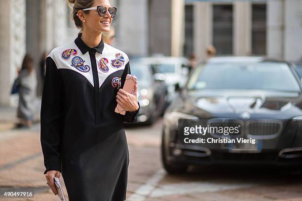 Fashion blogger Helena Bordon wears MSGM dress, Elena Ghisellini bag during Milan Fashion Week Spring/Summer 16 on September 27, 2015 in Milan, Italy.