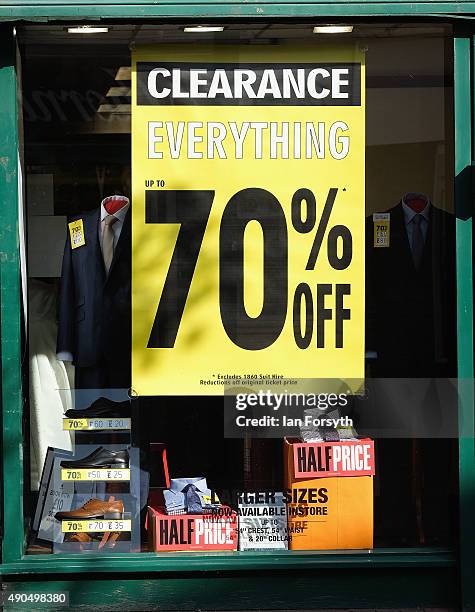 Poster advertising a clearance sale is displayed in a shop window on September 29, 2015 in Redcar, England. Following the announcement by SSI UK that...