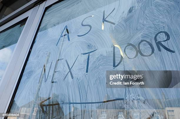 Directions are written on a shop window of a business premises in the high street on September 29, 2015 in Redcar, England. Following the...