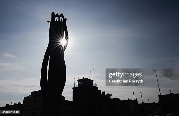 Sculpture is back lit by the sun on the seafront on September 29, 2015 in Redcar, England. Following the announcement by SSI UK that the steel...