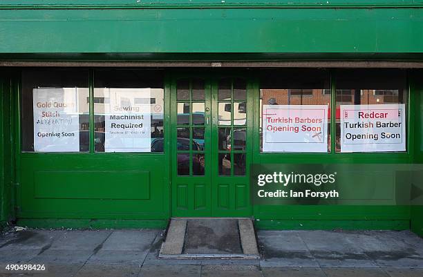 Shop displays posters advertising job vacancies and new businesses on September 29, 2015 in Redcar, England. Following the announcement by SSI UK...