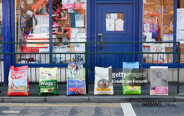 Bags of dog food are displayed on the side of the road outside a pet shop on September 29, 2015 in Redcar, England. Following the announcement by SSI...
