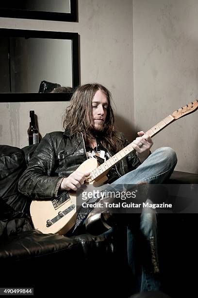 Portrait of American musician Jaren Johnston, vocalist and guitarist with country rock group The Cadillac Three, photographed backstage before a live...