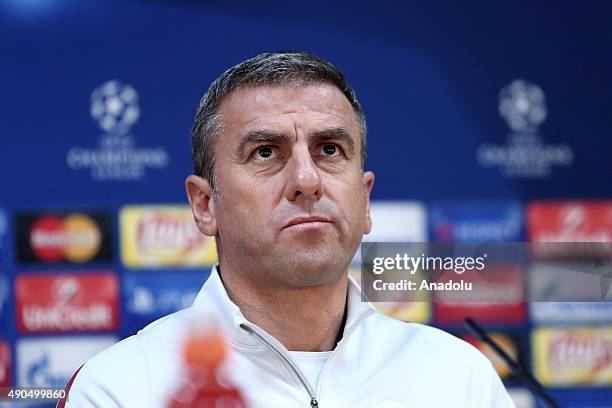 Galatasaray's head coach Hamza Hamzaoglu attends a press conference in Astana, Kazakhstan on September 29, 2015 ahead of the UEFA Champions League -...