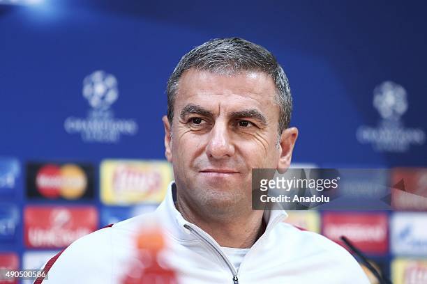 Galatasaray's head coach Hamza Hamzaoglu attends a press conference in Astana, Kazakhstan on September 29, 2015 ahead of the UEFA Champions League -...