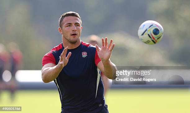 Sam Burgess catches the ball during the England training session at Pennyhill Park on September 29, 2015 in Bagshot, England.