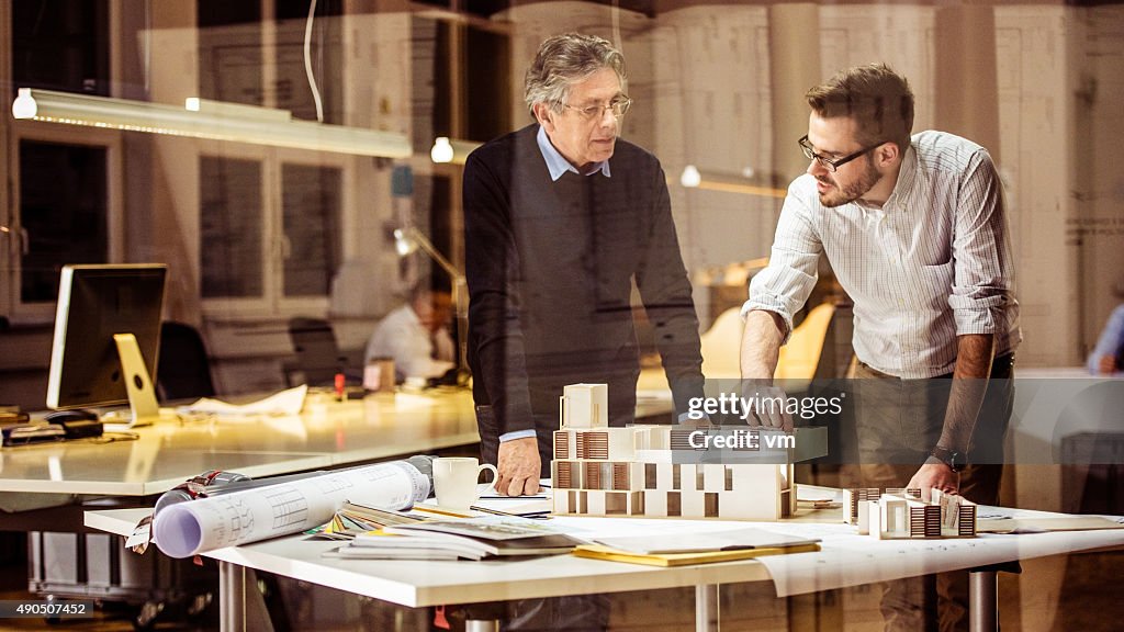 Two architects discussing new project