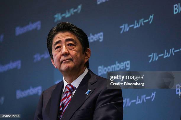 Shinzo Abe, Japan's prime minister, pauses while speaking during the Japan Finance Forum event in New York, U.S., on Tuesday, Sept. 29, 2015. Abe...