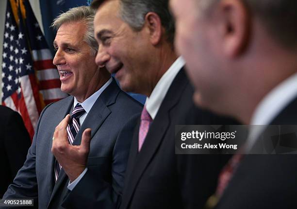 House Majority Leader Rep. Kevin McCarthy and Speaker of the House Rep. John Boehner share a moment as they speak to member of the media after a...