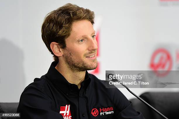 Romain Grosjean of France speaks during a press conference as Haas F1 Team announces Grosjean as their driver for the upcoming 2016 Formula 1 season...