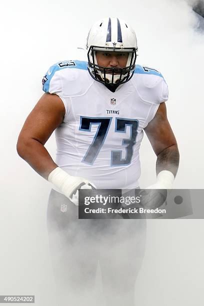 Jeremiah Poutasi of the Tennessee Titans runs onto the field prior to a game against the Indianapolis Colts at Nissan Stadium on September 27, 2015...