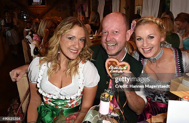 Simone Ballack, Brian Rennie and Eva Gruenbauer attend the Ladies Lunch at Fisch Baeda during the Oktoberfest 2015 at Theresienwiese on September 29,...