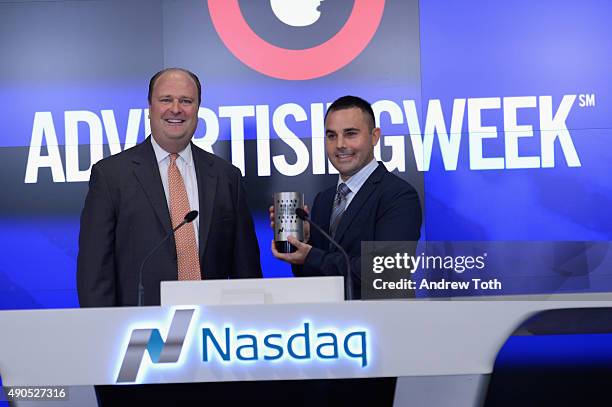 At NASDAQ David Wicks and President and COO of Advertising Week Lance Pillersdorf ring the Closing Bell at NASDAQ during Advertising Week 2015 AWXII...