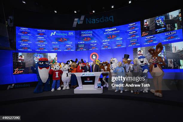 At NASDAQ David Wicks and President and COO of Advertising Week Lance Pillersdorf ring the Closing Bell with brand mascots at NASDAQ during...