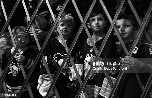 Young hockey fans wait to greet the players before practice for the NHL Kraft Hockeyville USA preseason game between the Tampa Bay Lightning and the...