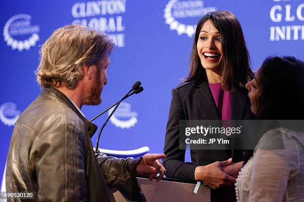 Actress and Producer of Girl Rising, Freida Pinto taks with Sean Penn during The Future of Girl's Education session on the fourth day of the 2015...