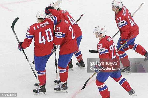 Ken Andre Olimb of Norway celebrates his goal with team-matte during the 2014 IIHF World Championship between Slovakia and Norway at Chizhovka arena...