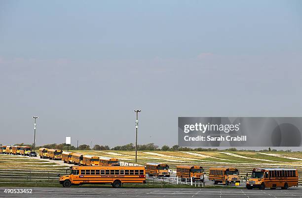 Students arrive for the Speeding To Read Kickoff Assembly at Texas Motor Speedway on September 29, 2015 in Fort Worth City.