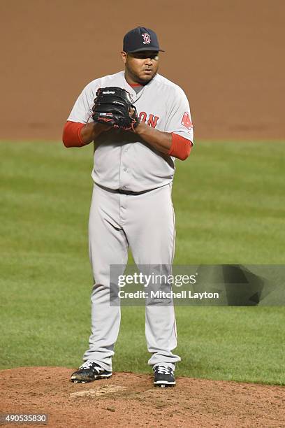 Jean Machi of the Boston Red Sox pitches during a baseball game against the Baltimore Orioles at Oriole Park at Camden Yards on September 15, 2015 in...