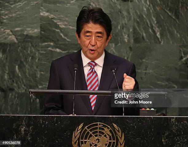 Prime Minister of Japan Shinzo Abe addresses the United Nations General Assembly at UN headquarters on September 29, 2015 in New York City. The war...