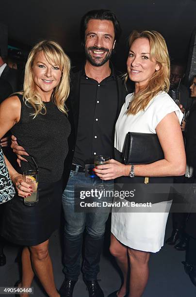 Sarah Hadland, Christian Vit and Tamzin Outhwaite attend "Above / Beyond" hosted by American Airlines at One Marylebone on September 29, 2015 in...