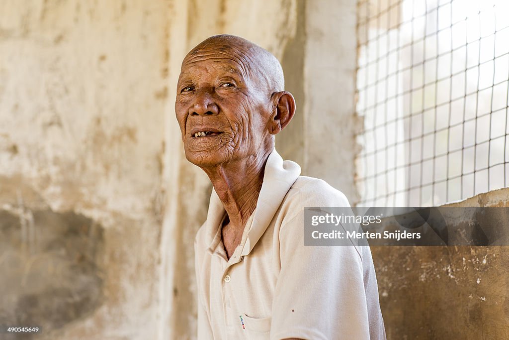 Portrait of Shan man at natural spring pool