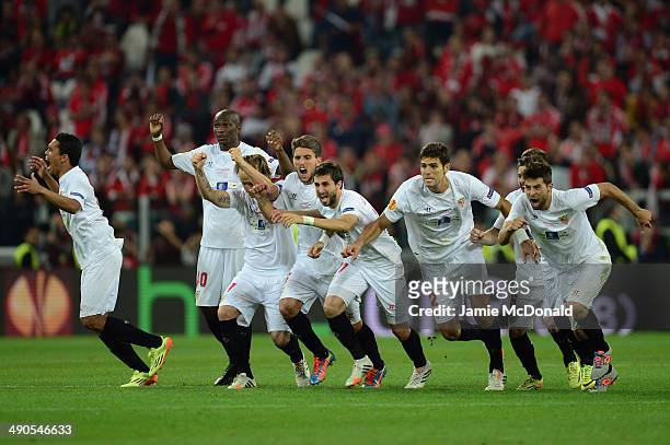 Sevilla players celebrate after Kevin Gameiro of Sevilla scores the winning penalty in the shoot out during the UEFA Europa League Final match...