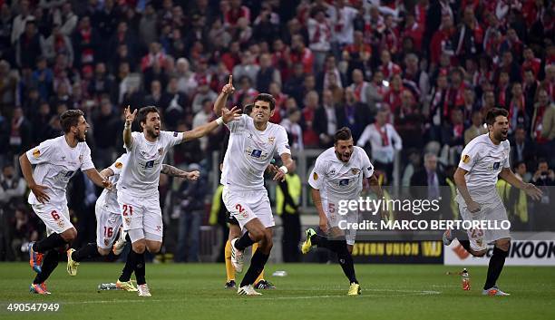 Sevilla's Argentinian defender Nicolas Pareja , Sevilla's Argentinian defender Federico Fazio, Sevilla's Portuguese defender Diogo Figueiras and...