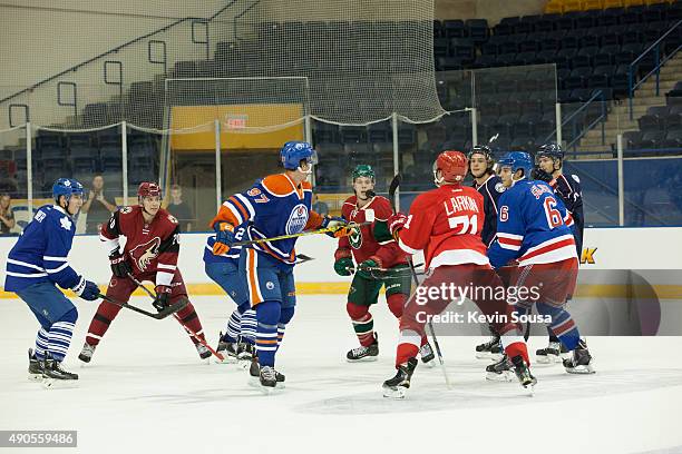 Group of NHL rookies and prospects play a puck-control game during a photo shoot at the 2015 NHLPA Rookie Showcase at Mattamy Athletic Centre on...