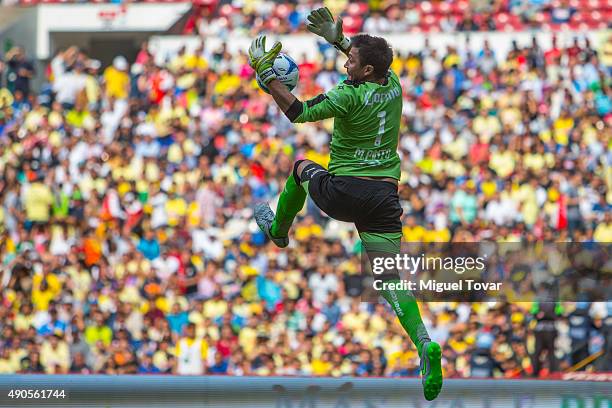 Miguel Pinto goalkeeper of Atlas jumps to catch the ball during a 2nd round match between America and Atlas as part of the Apertura 2015 Liga MX at...