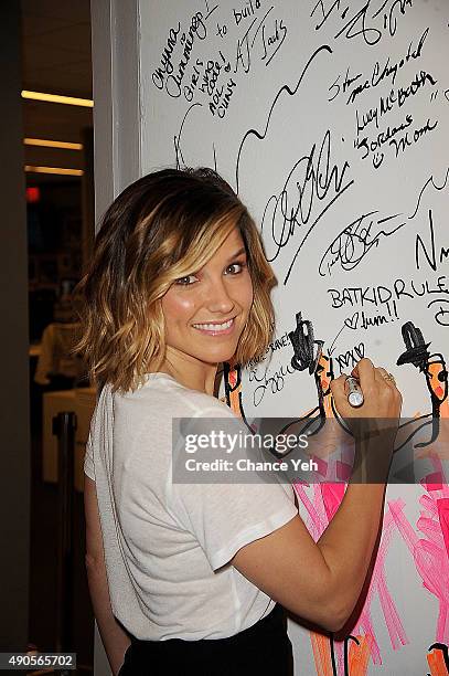 Sophia Bush signs the wall at AOL Build presents "Chicago P.D" at AOL Studios In New York on September 29, 2015 in New York City.