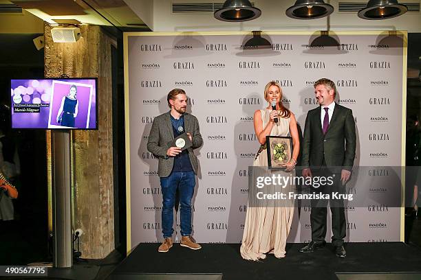 Klaas Heufer-Umlauf, Mareile Hoeppner and Arnim Fischer attend the Pandora At Grazia Best Dressed Award at Soho House on May 14, 2014 in Berlin,...