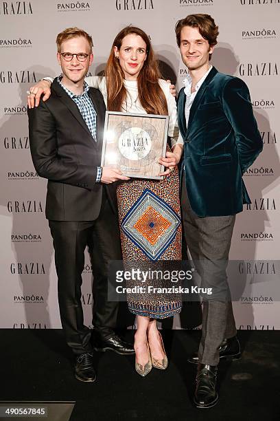 Oliver Luehr, Julia Malik and Thomas Bentz attend the Pandora At Grazia Best Dressed Award at Soho House on May 14, 2014 in Berlin, Germany.