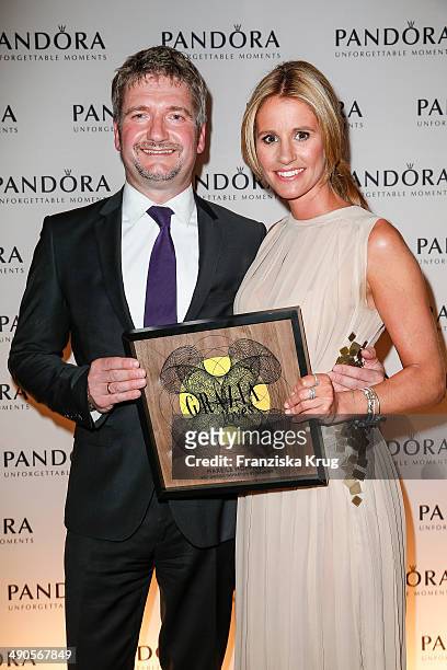 Arnim Fischer and Mareile Hoeppner attend the Pandora At Grazia Best Dressed Award at Soho House on May 14, 2014 in Berlin, Germany.