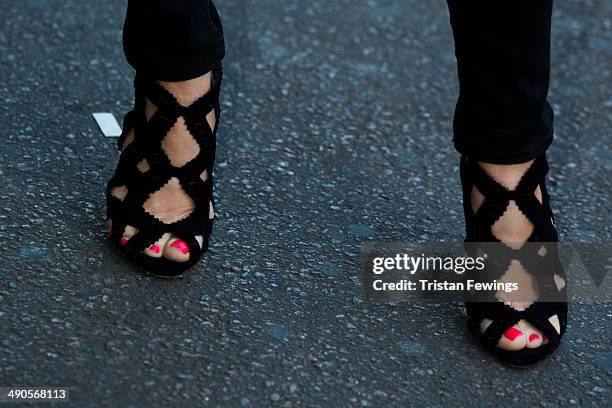 Louise Adams attends a photocall to launch the David Beckham for H&M Swimwear collection on May 14, 2014 in London, England.